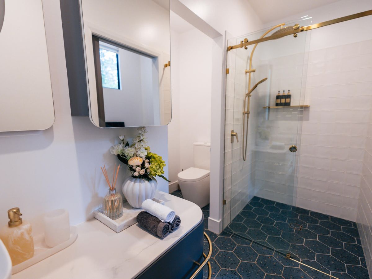 Modern bathroom at Rustic Pine Escape with premium bath products