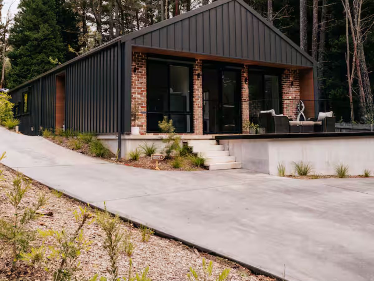 Private parking and exterior arrival area at Rustic Pine Escape
